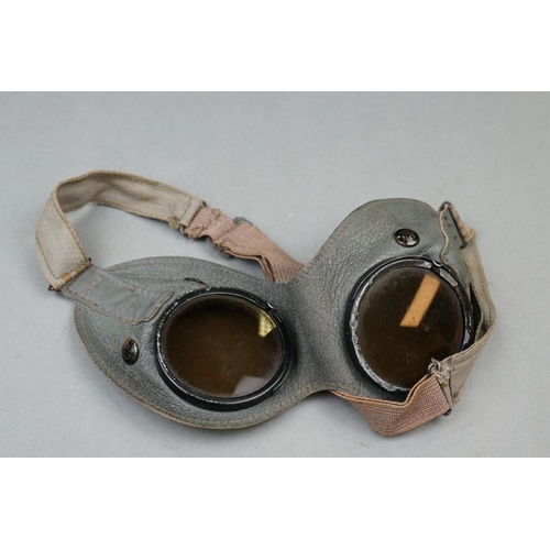 340 - A Pair Of World War Two German General Purpose Tinted Goggles Together With A Coat Hanger.