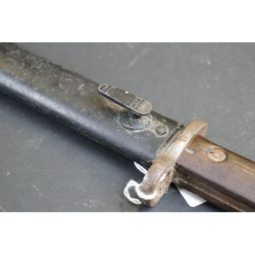 235 - A World War One Era German Mauser Bayonet With Original Scabbard, No Visible Markings.