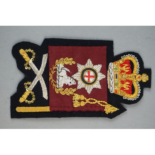 381 - A Collection Of British Military Coldstream Guards Insignia To Include Cloth Shoulder Titles, Anodis... 