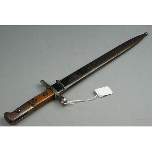 290 - A World War One German Rifle Bayonet And Scabbard, Stamped Waffenfabrik Neuhausen.