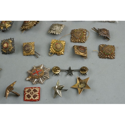 395 - A Large Collection Of Military Officers Shoulder Pips And Stars.