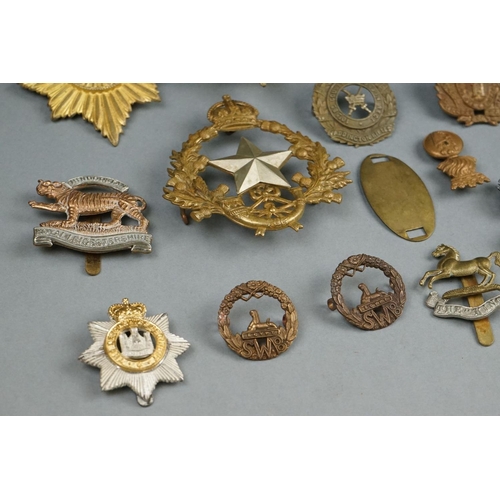 396 - A Collection Of Assorted Military Cap Badges Including Restrikes And Copies To Include The West York... 