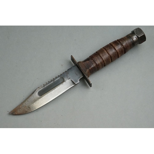 402 - A Japanese Air Force Survival / Fighting Knife Complete With Leather Scabbard And Sharpening Stone.