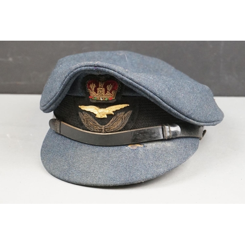 403 - A Vintage Royal Air Force Officers Peaked Cap Complete With Queens Crown Cap Badge Together With Fem... 