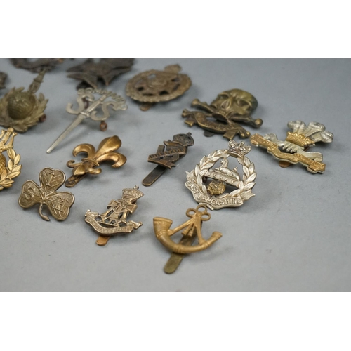 57A - A Collection Of Approx Twenty Mainly British Military Cap Badges To Include The 7th Battalion Of The... 