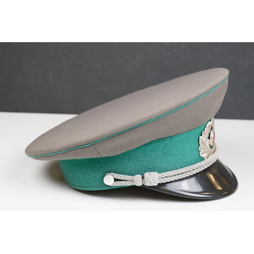 314 - A East German Military Border Guards Peaked Cap Complete With Original Cap Badge.