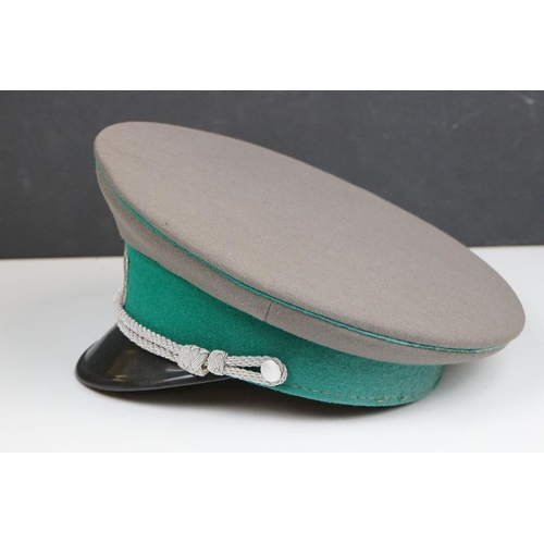 314 - A East German Military Border Guards Peaked Cap Complete With Original Cap Badge.