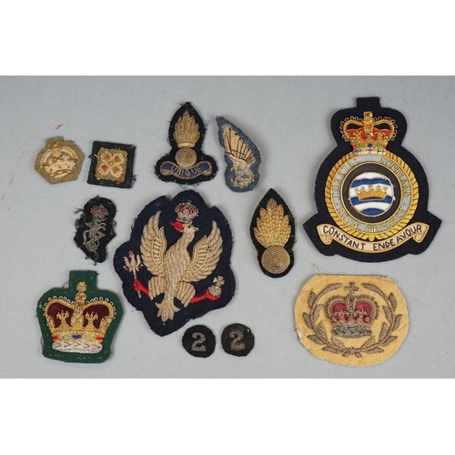 371 - A Large Collection Of Mainly British Military Gold And Silver Embroidered Regimental Cloth Badges.