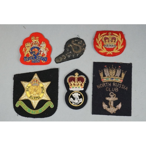 371 - A Large Collection Of Mainly British Military Gold And Silver Embroidered Regimental Cloth Badges.