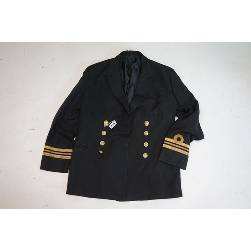 419 - A British Royal Navy Regimental Jacket Complete With Naval Buttons And Cuffs.