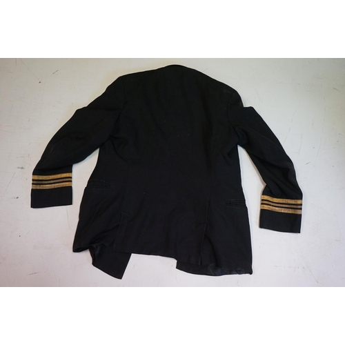 419 - A British Royal Navy Regimental Jacket Complete With Naval Buttons And Cuffs.