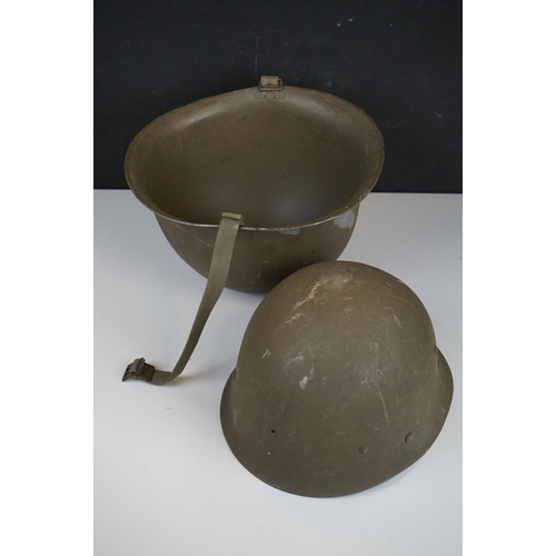 423 - A United States M1 Military Helmet Complete With Liner And Strap.