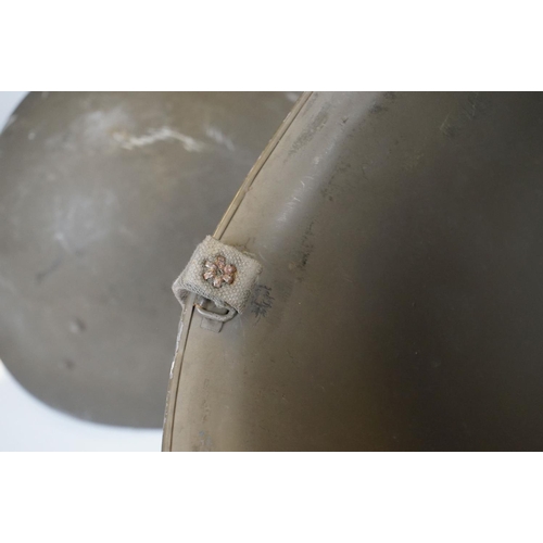 423 - A United States M1 Military Helmet Complete With Liner And Strap.