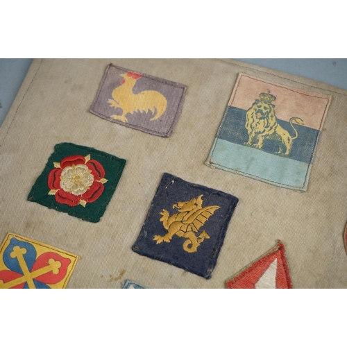 433 - A Collection Of Approx Twenty Five British Military Cloth Badges, Sewn To Cloth And Mounted On Board... 