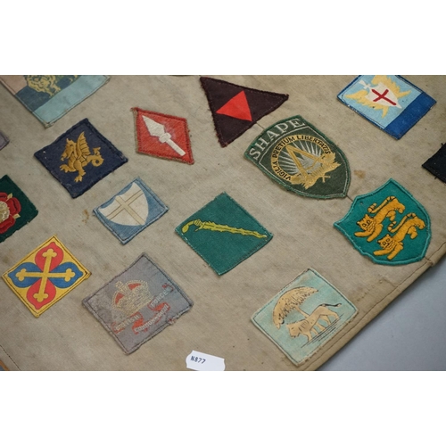 433 - A Collection Of Approx Twenty Five British Military Cloth Badges, Sewn To Cloth And Mounted On Board... 