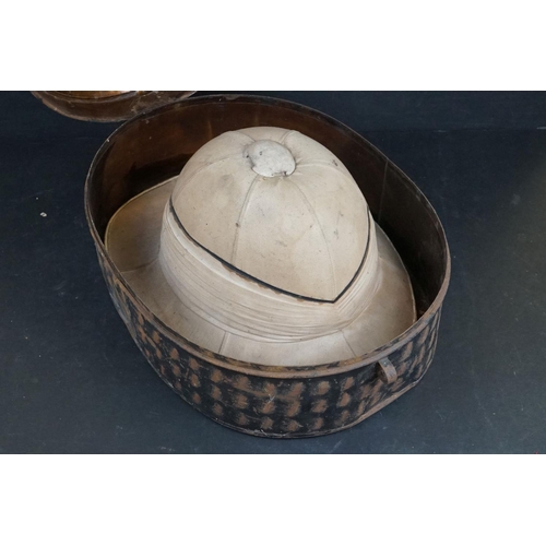 443 - A British Military Pith Helmet Contained Within A Metal Hat Box By Gieves, The Box Marked E.W. BRIGG... 