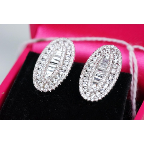 337 - Pair of silver and CZ set stud earrings