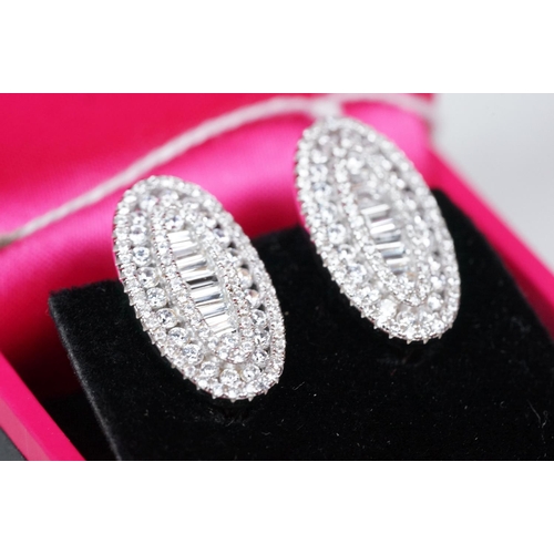 337 - Pair of silver and CZ set stud earrings