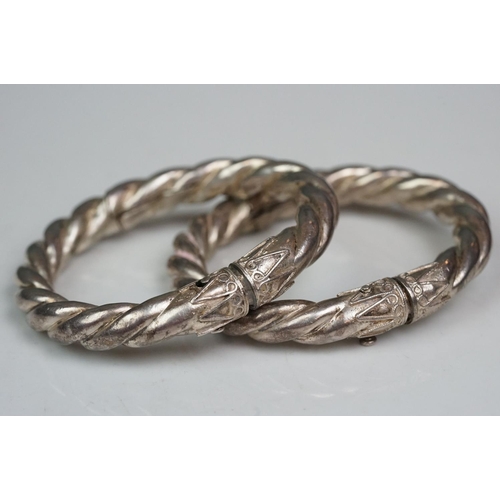 341 - Pair of hand made silver bangles
