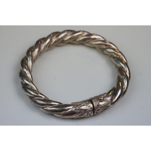 341 - Pair of hand made silver bangles