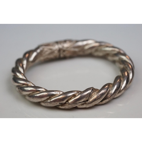 341 - Pair of hand made silver bangles