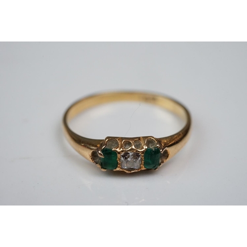 342 - Three rings: Diamond and emerald three stone 18ct yellow gold ring, central cushion cut diamond with... 