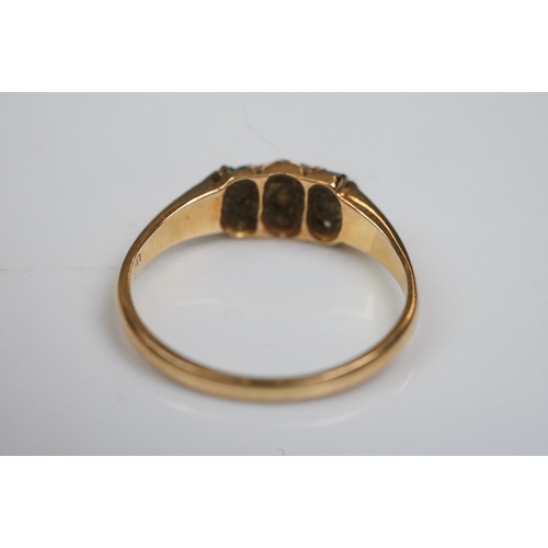 342 - Three rings: Diamond and emerald three stone 18ct yellow gold ring, central cushion cut diamond with... 