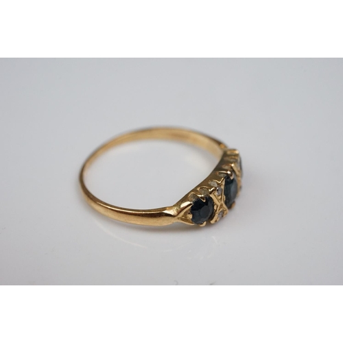 342 - Three rings: Diamond and emerald three stone 18ct yellow gold ring, central cushion cut diamond with... 