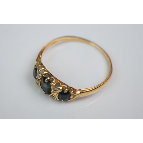 342 - Three rings: Diamond and emerald three stone 18ct yellow gold ring, central cushion cut diamond with... 