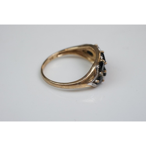 342 - Three rings: Diamond and emerald three stone 18ct yellow gold ring, central cushion cut diamond with... 