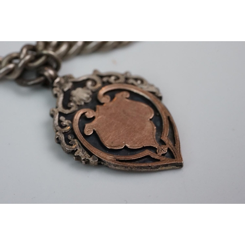 348 - A collection of Stirling silver watch fobs together with two Albert chains and a silver ring.