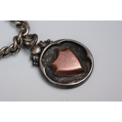 348 - A collection of Stirling silver watch fobs together with two Albert chains and a silver ring.