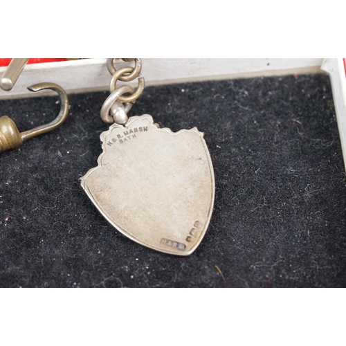 348 - A collection of Stirling silver watch fobs together with two Albert chains and a silver ring.