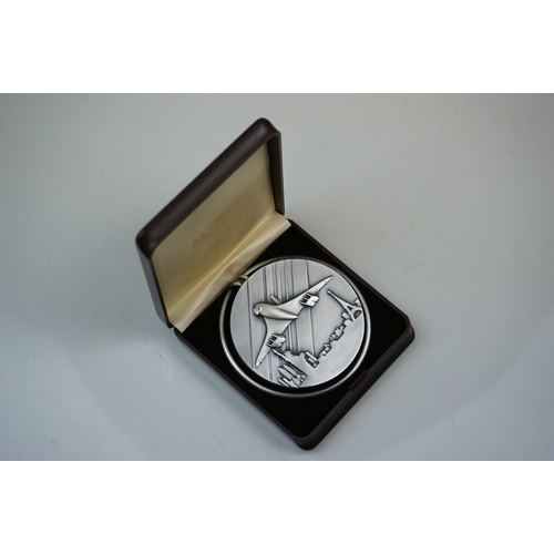 296 - A collection of Concorde collectables together with a small quantity of coins.