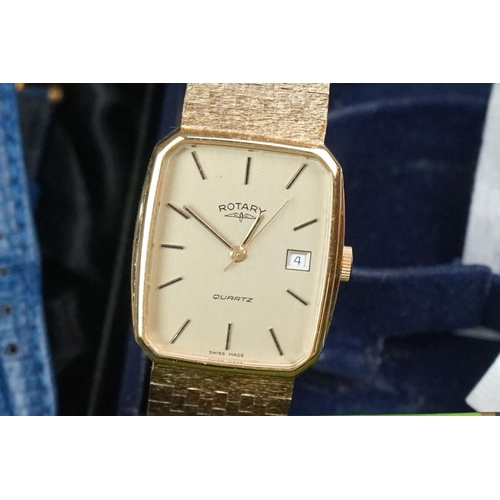 297 - A collection of watches to include Rotary and Timex examples together with a travel clock