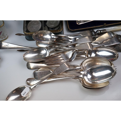 298 - A box of mixed collectables to include a hallmarked silver candlestick, a cased hallmarked silver fo... 