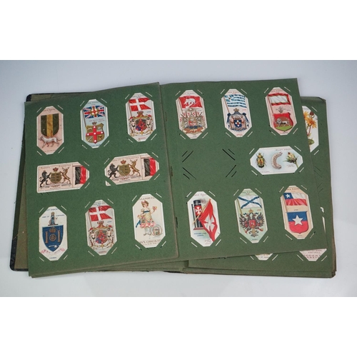 298 - A box of mixed collectables to include a hallmarked silver candlestick, a cased hallmarked silver fo... 