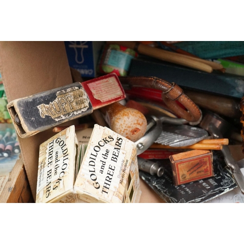 304 - A box of mixed collectables to include a antique pair of children's shoes, cutthroat razor, cigarett... 