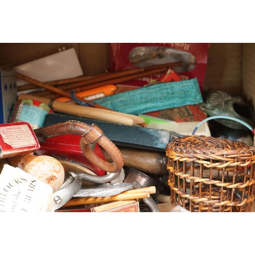 304 - A box of mixed collectables to include a antique pair of children's shoes, cutthroat razor, cigarett... 