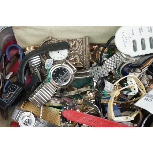 308 - A large collection of mainly quartz watches to include advertising examples.