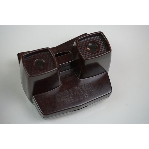 318 - A small collection of mainly foreign coins and banknotes together with a collection of view master s... 