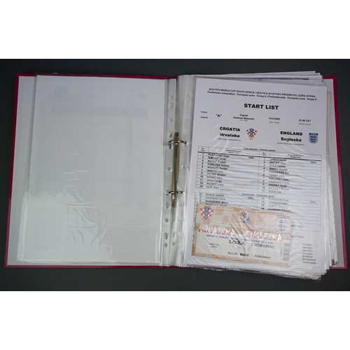 321 - Football - England World Cup 2010 qualifying, a binder containing home & away teamsheets, tickets, p... 