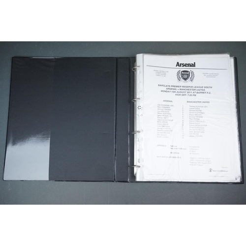 323 - Football - Manchester United fc reserve and youth teams 2011/12, a binder containing approx. 50 home... 