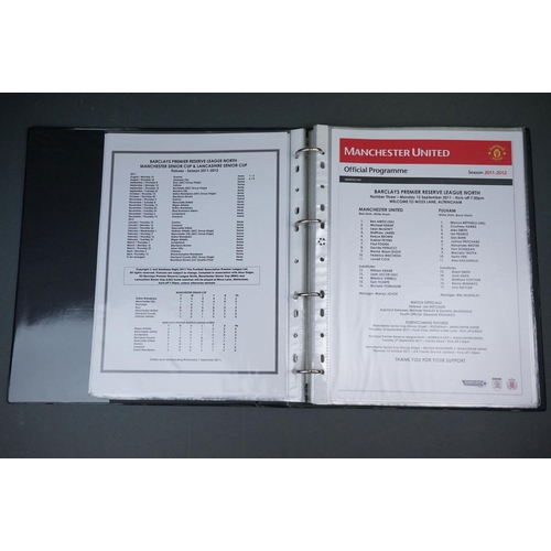 323 - Football - Manchester United fc reserve and youth teams 2011/12, a binder containing approx. 50 home... 