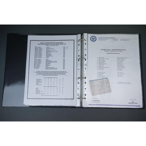 323 - Football - Manchester United fc reserve and youth teams 2011/12, a binder containing approx. 50 home... 