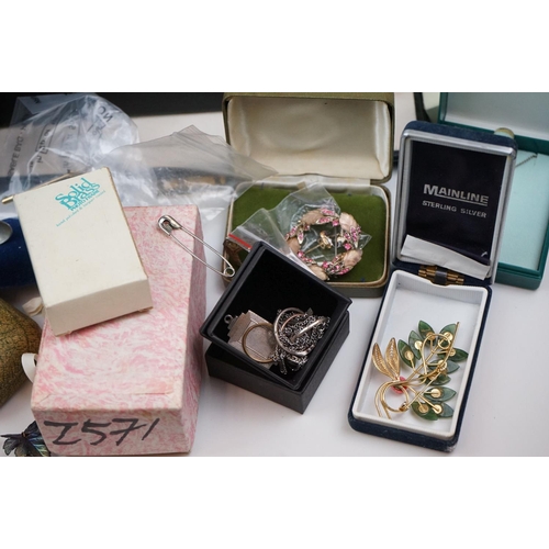 335 - A large collection of mainly vintage costume jewellery to include silver bangles and other silver ex... 