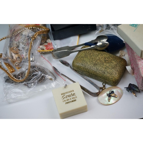 335 - A large collection of mainly vintage costume jewellery to include silver bangles and other silver ex... 