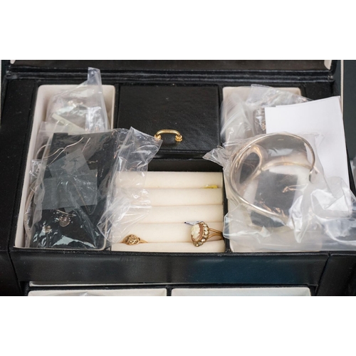 335 - A large collection of mainly vintage costume jewellery to include silver bangles and other silver ex... 