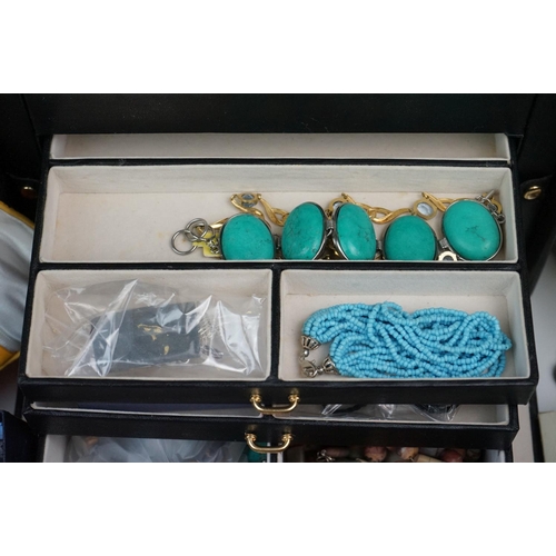 335 - A large collection of mainly vintage costume jewellery to include silver bangles and other silver ex... 