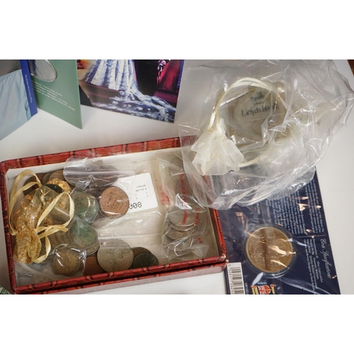 316 - A collection of British and world coins to include commemorative and proof examples, an American sil... 